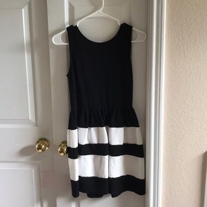 Black dress with large white stripes
